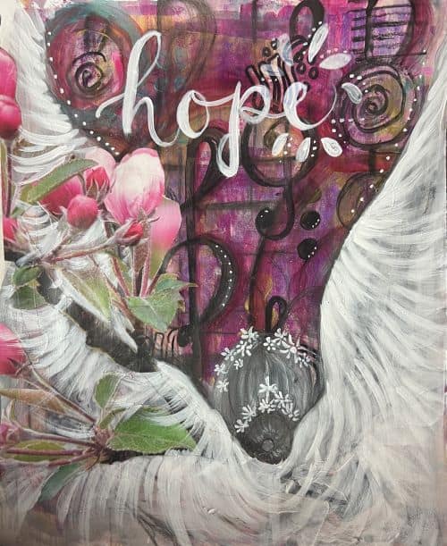 inspirational mixed media art journal page with angel and music notes flowers and hand lettered word hope