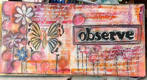 art journaling supplies sample page in dylusions creative journal with the word observe over acrylic painted bakground and white posca paint pen handwriting